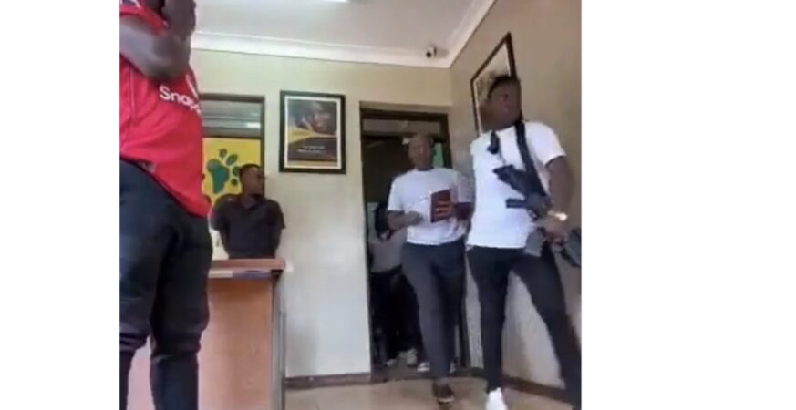 Armed Men Haul Political Analyst Charles Rwomushana Out of Kampala Radio Studio in Broad Daylight 8 Armed Men Haul Political Analyst Charles Rwomushana Out of Kampala Radio Studio in Broad Daylight