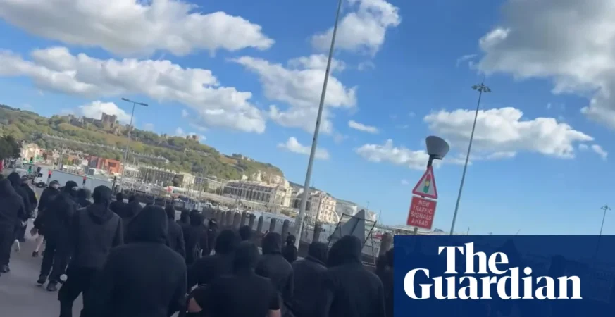 Masks, Black Fatigues, and Blocked Roads: Why Dover's Anti-Immigration Protest Has Ministers Furious 8 Masks, Black Fatigues, and Blocked Roads: Why Dover's Anti-Immigration Protest Has Ministers Furious